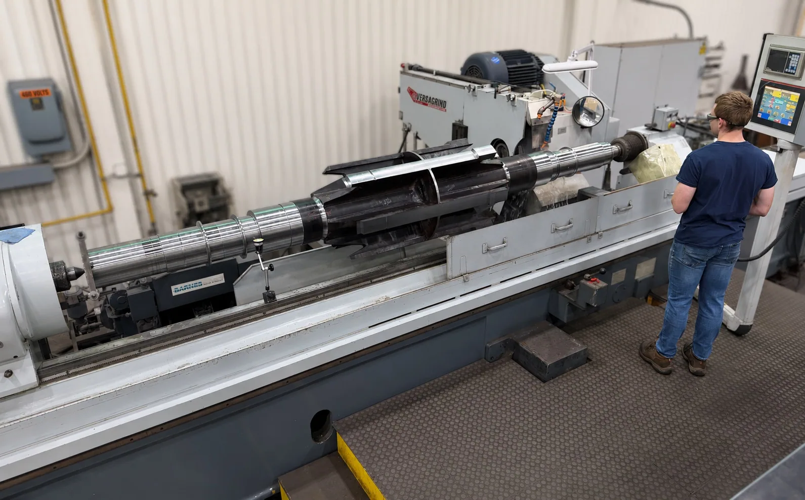 Precision grinding of a power generation rotor shaft at HFW Industries