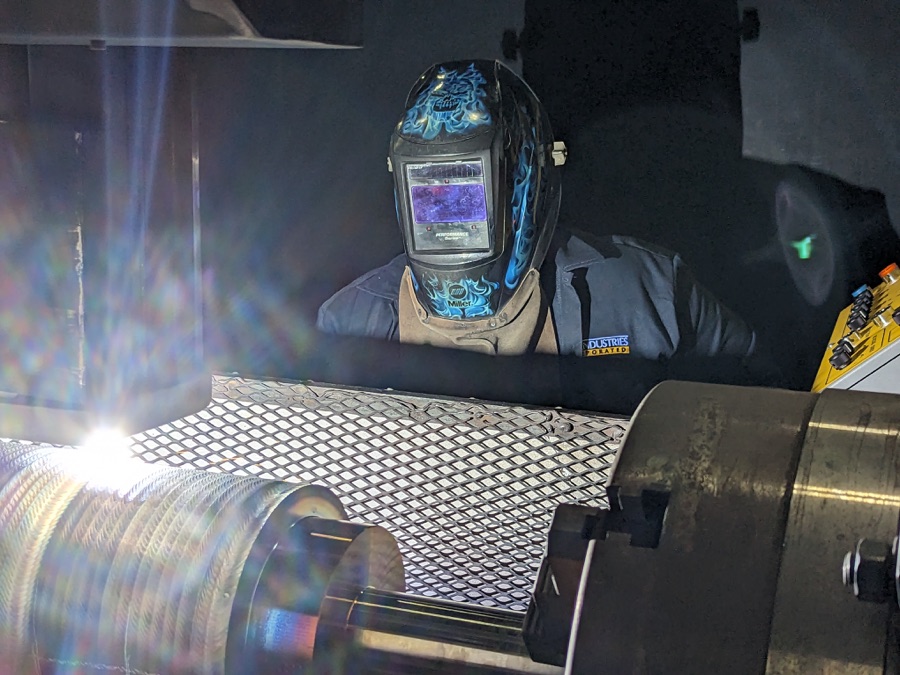 Hardfacing Weld Overlay Process | HFW Industries Hardfacing weld overlay applied to an industrial component at HFW Industries